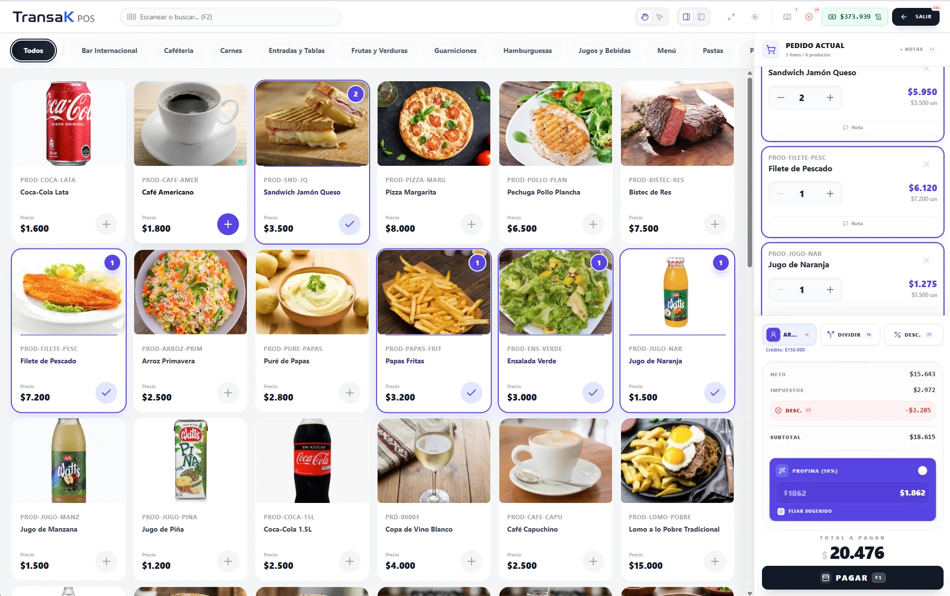 Pantalla de venta táctil de TransaK POS con catálogo de productos fotografiados y el pedido en curso